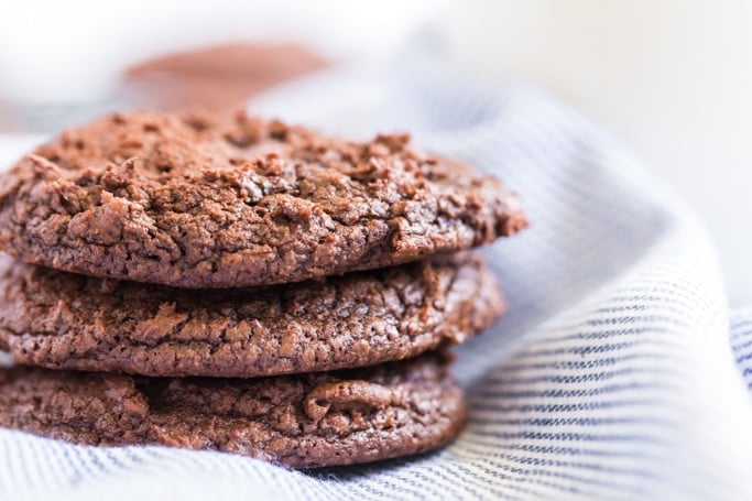 chocolate cookies in a blue/grey napkin