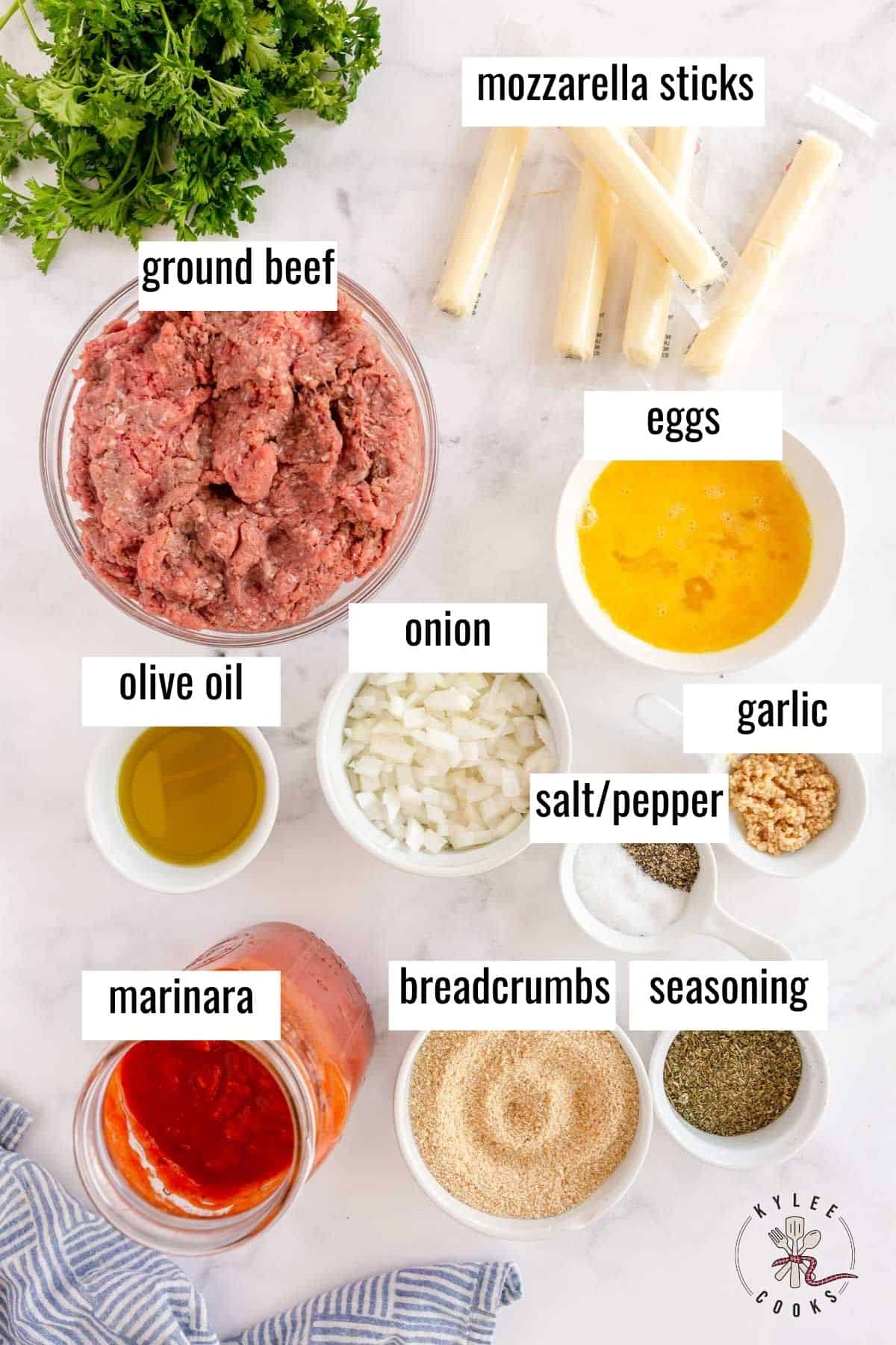ingredients to make cheese stuffed meatballs laid out and labeled