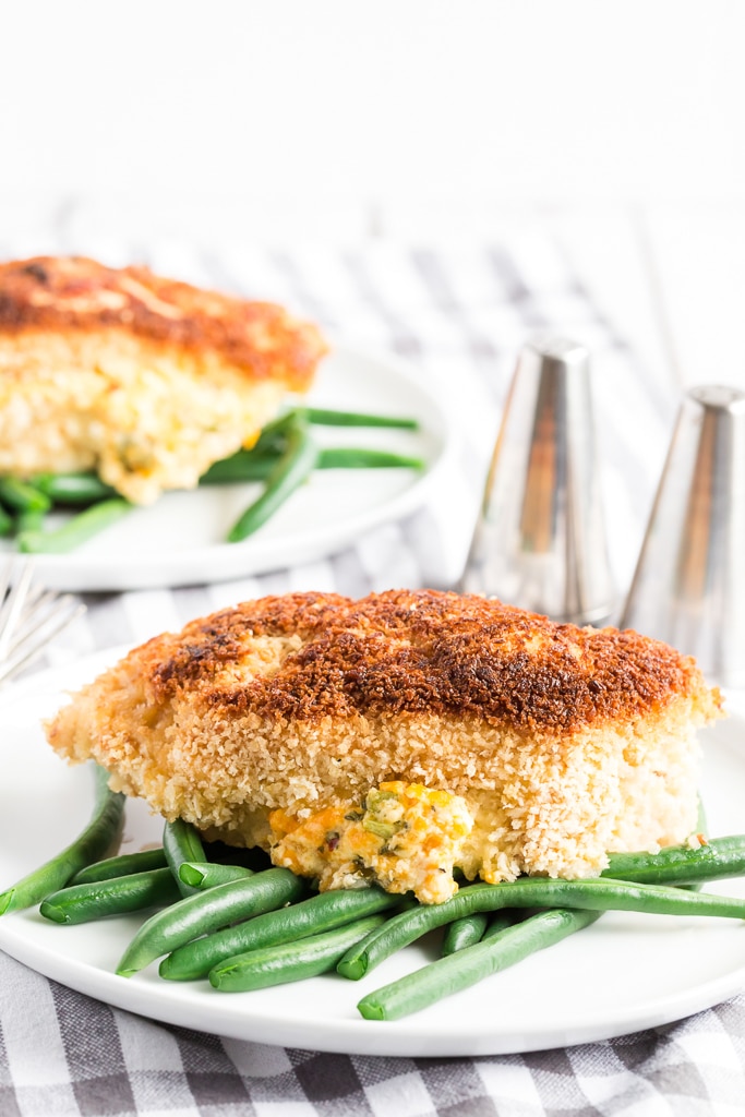jalapeno popper chicken on top of green beans