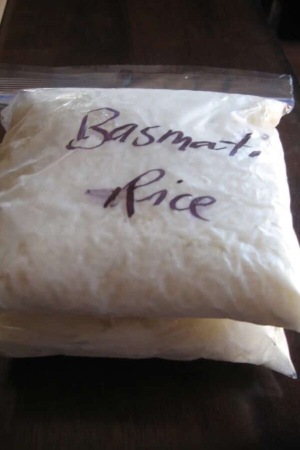 ziploc bags full of cooked rice marked with basmati rice