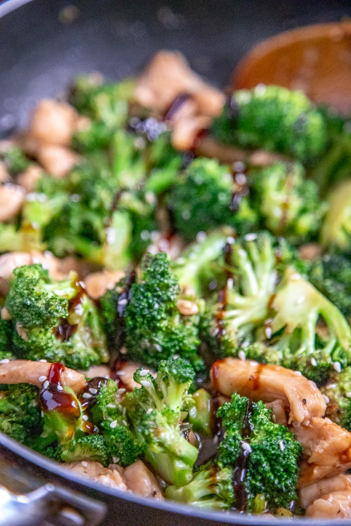 Chicken broccoli stir fry in a wok