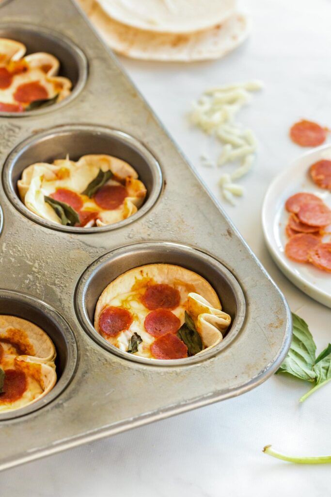 mini pizzas in a pan