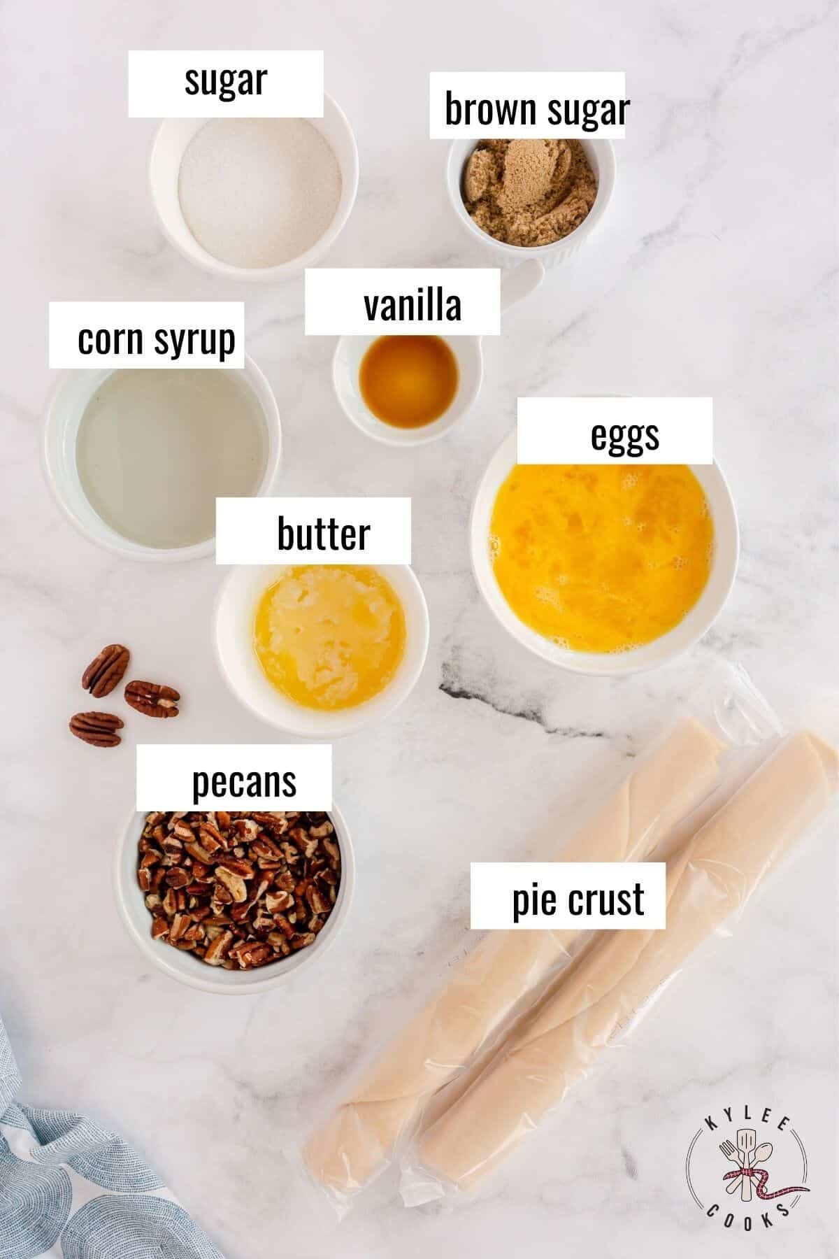 ingredients for pecan pie laid out and labeled