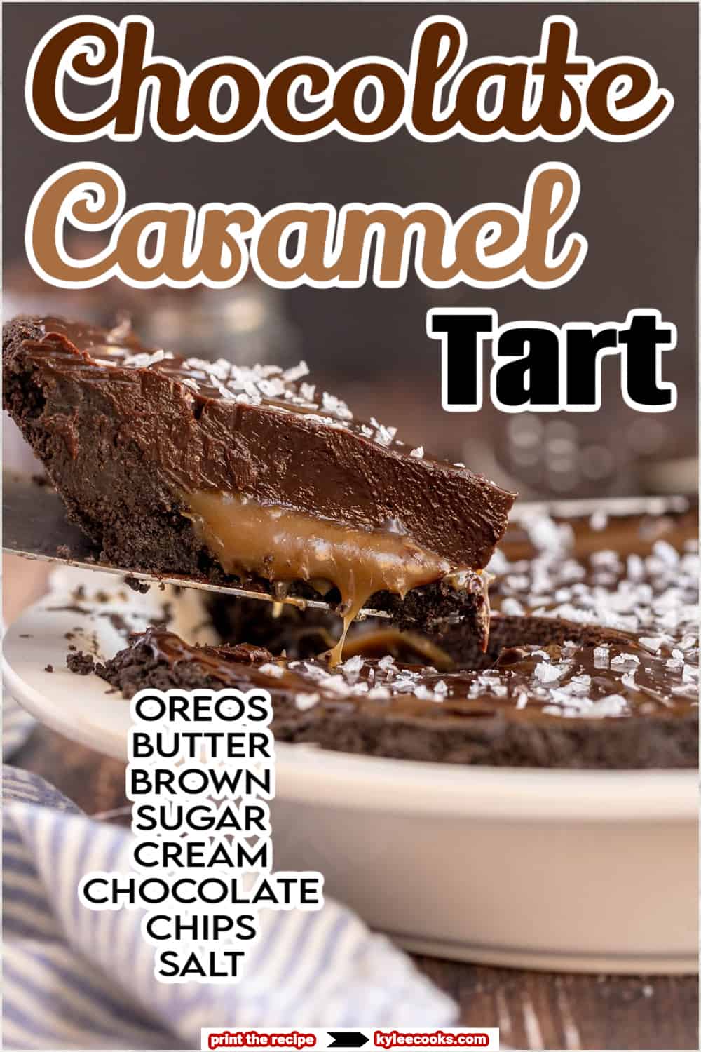 Chocolate Caramel tart in a pie plate with a slice being removed.