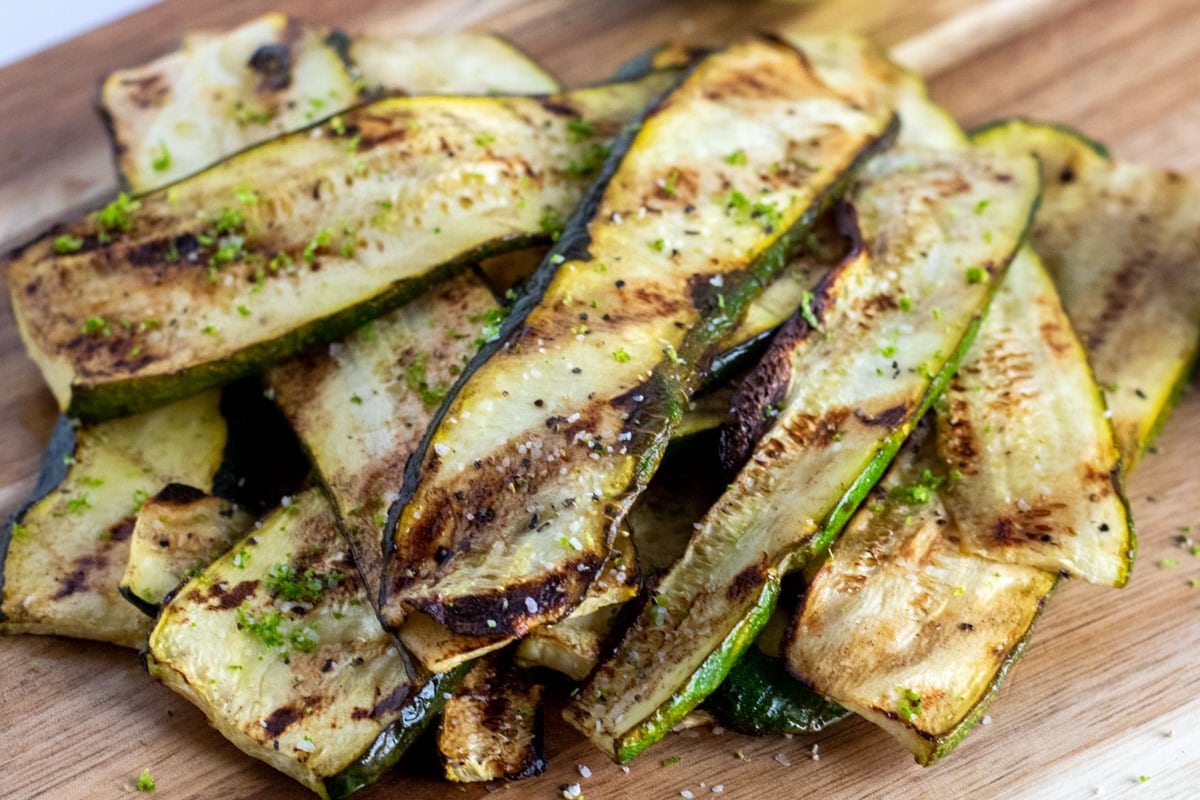 grilled zucchini on a chopping board  
