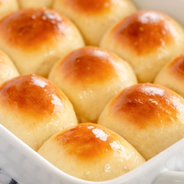 bread rolls in a white baking dish