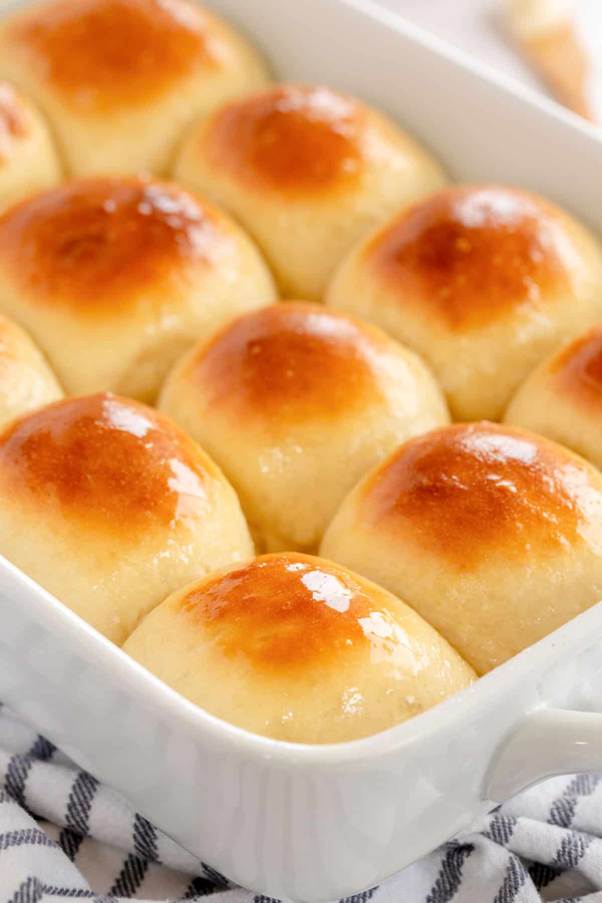 bread rolls in a white baking dish