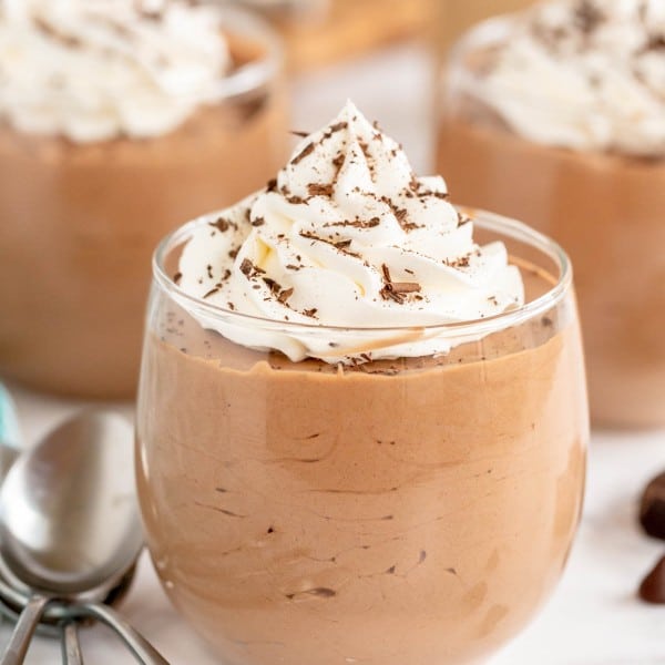 chocolate mousse in a glass with whipped cream