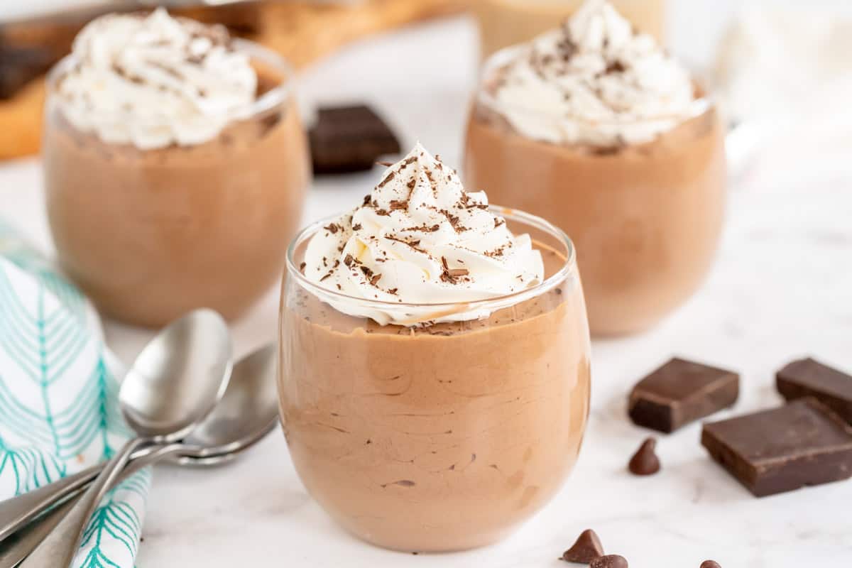 chocolate mousse in three glass cups