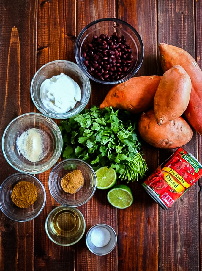 baked sweet potatoes with black bean salad ingredients laid out