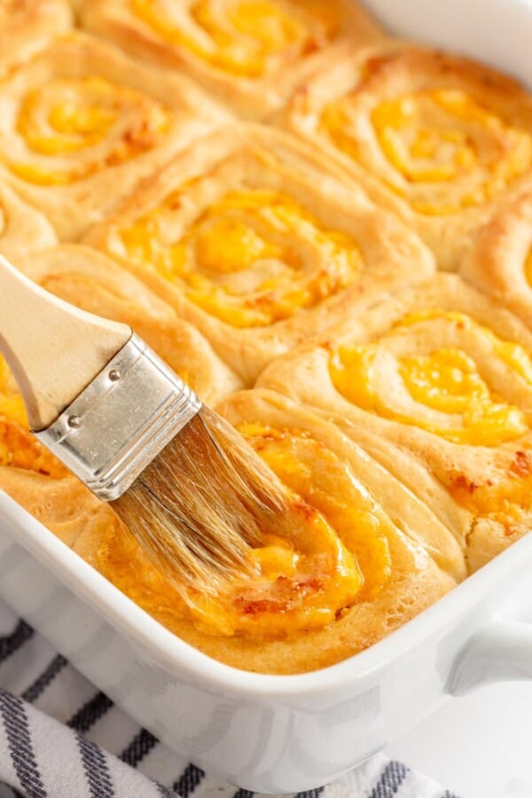 Garlic Cheese Bread with a pastry brush and butter