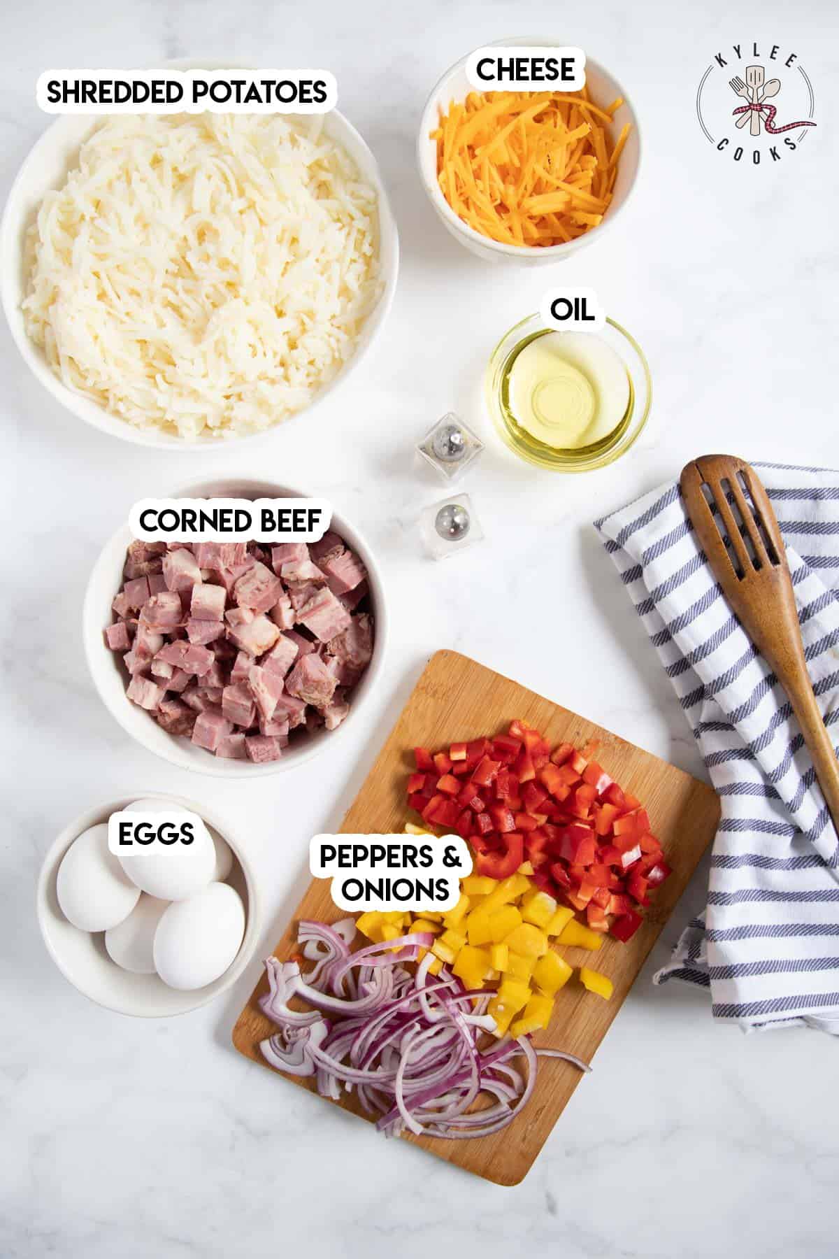 ingredients to make corned beef hash laid out and labeled
