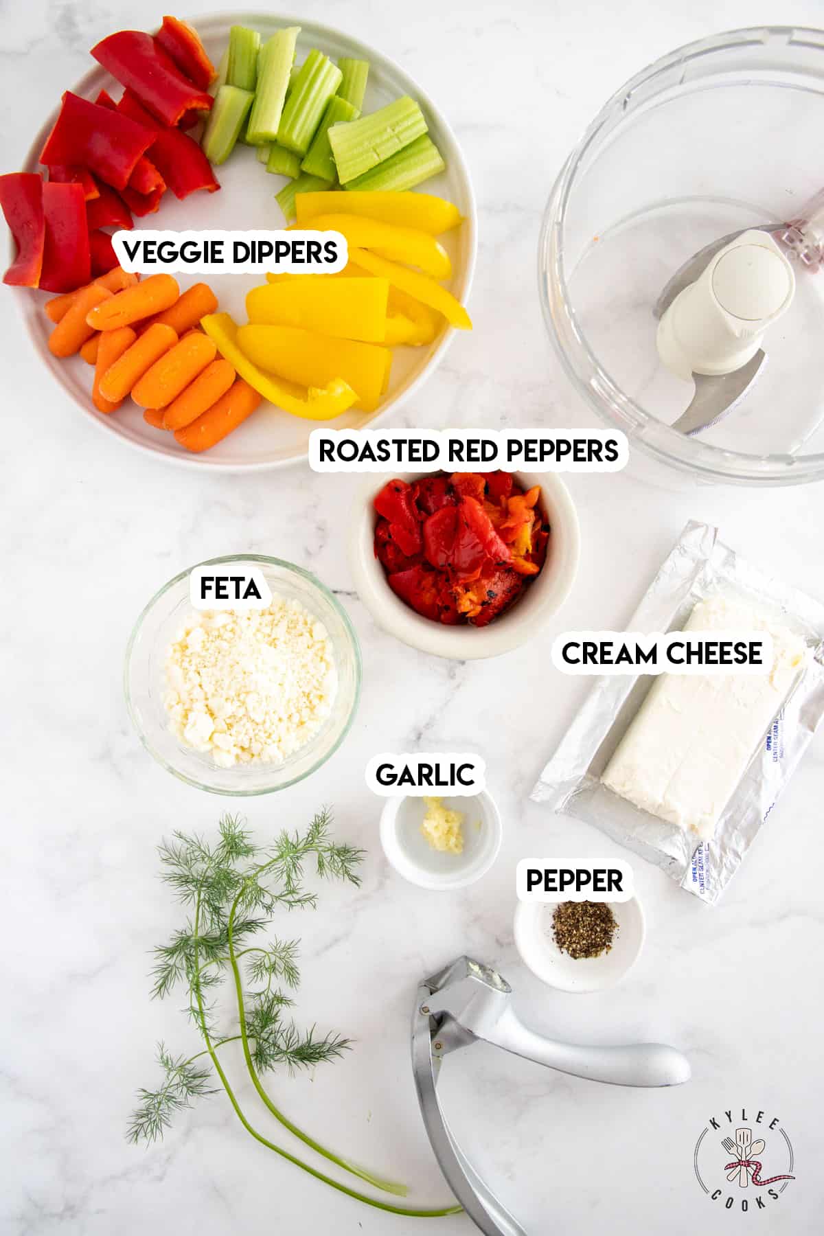 ingredients to make whipped feta dip laid out and labeled