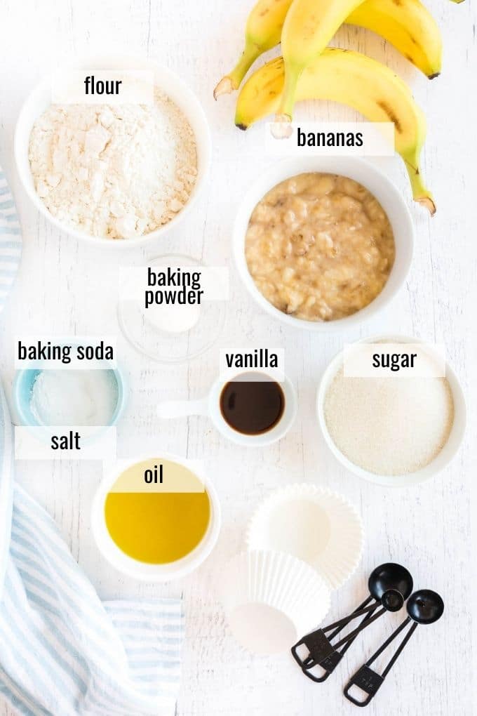 ingredients for banana cupcakes laid out and labeled