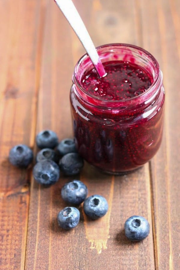chia seed jam in a jar with blueberries