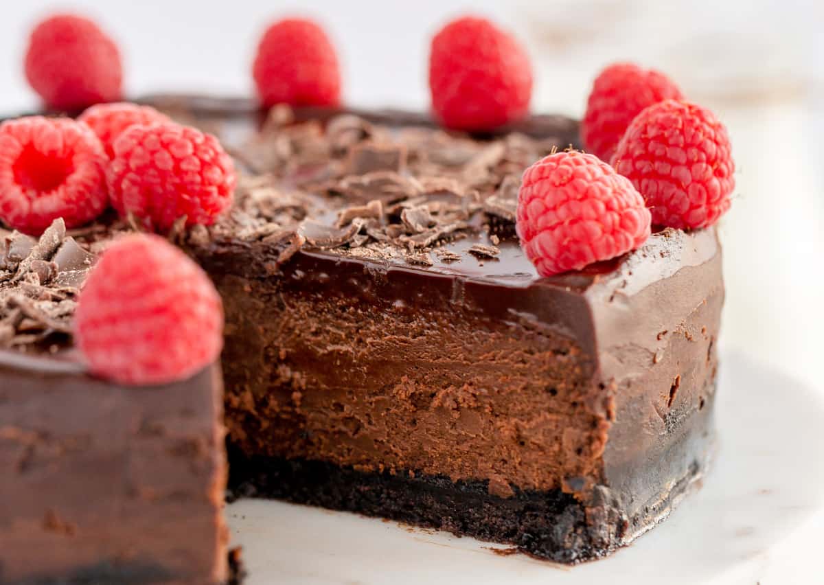chocolate cheesecake with raspberries on top