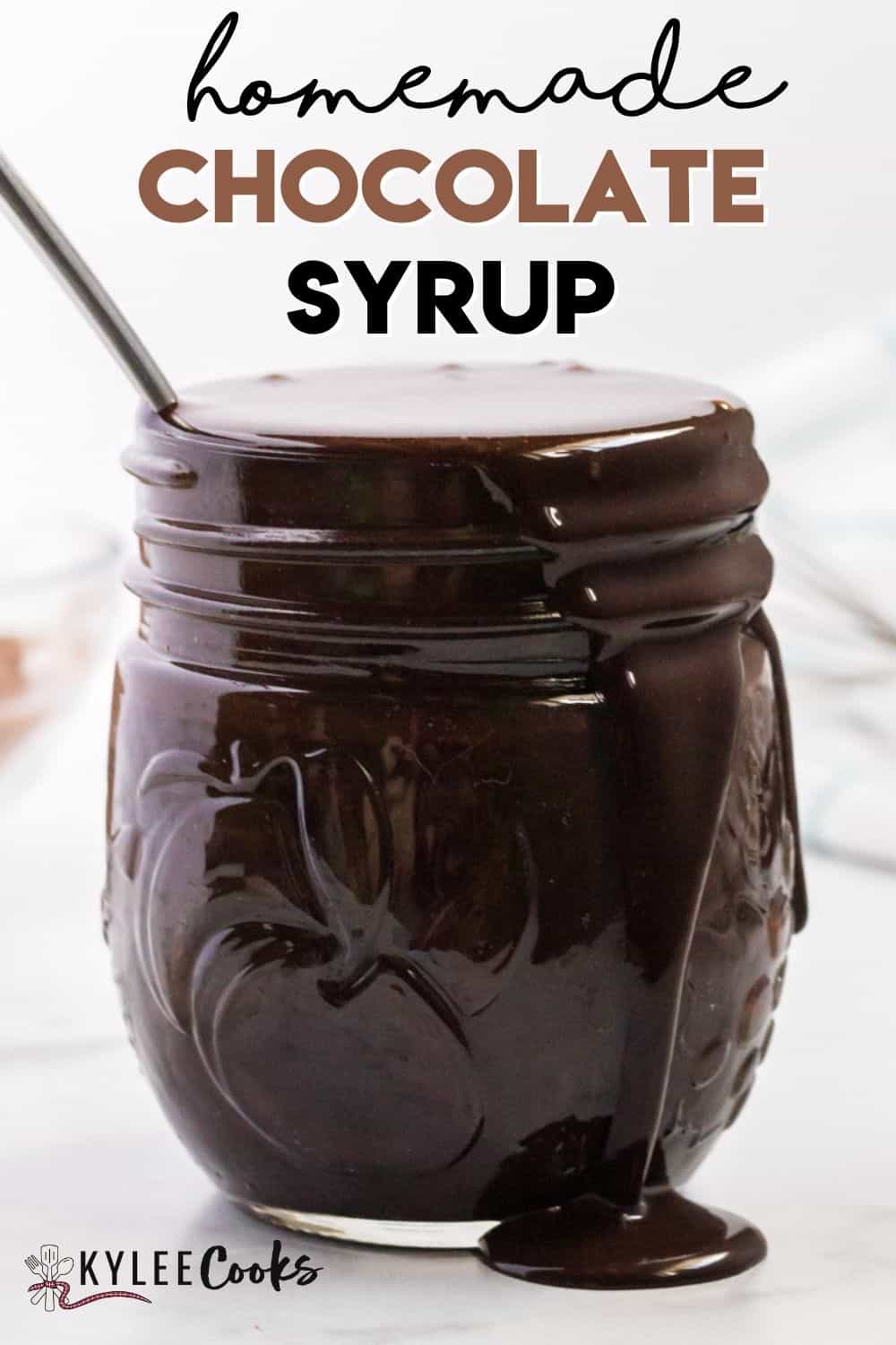 chocolate syrup in a jar with recipe title in text overlaid
