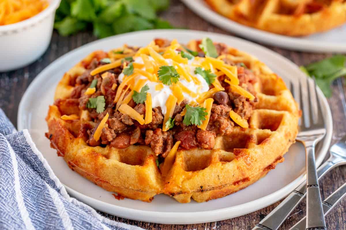 savory waffle with chili on top