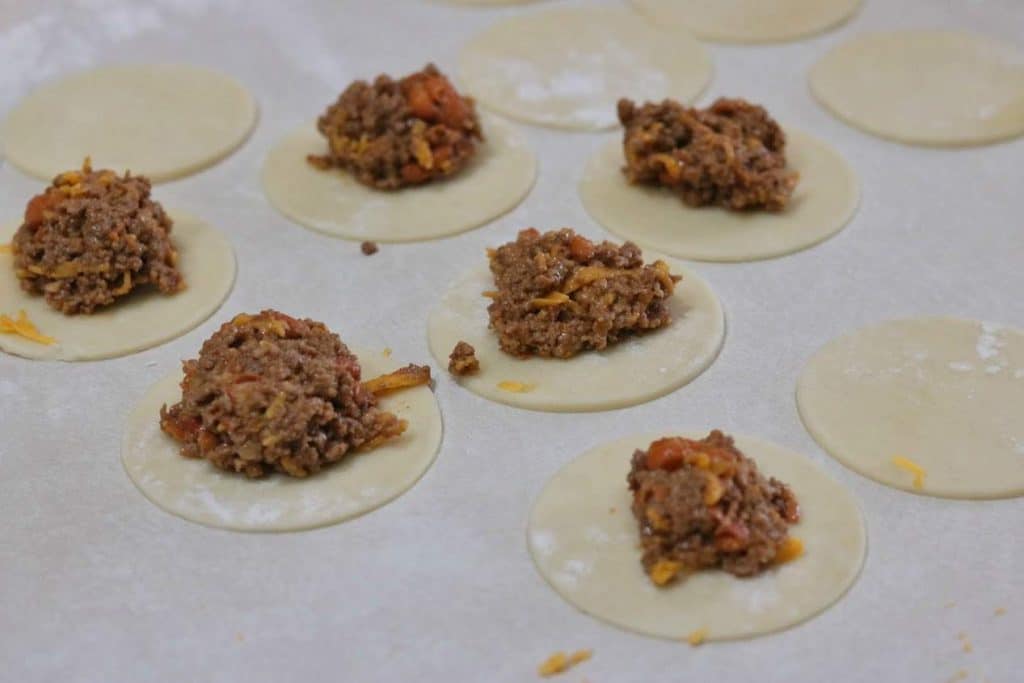taco hand pies process shots - filling the pies