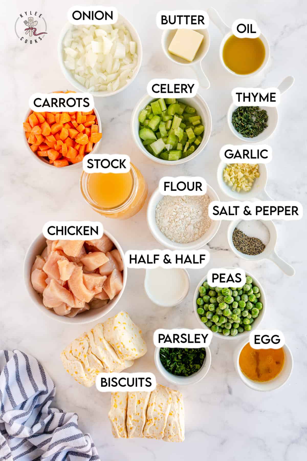 ingredients to make chicken pot pie laid out and labeled