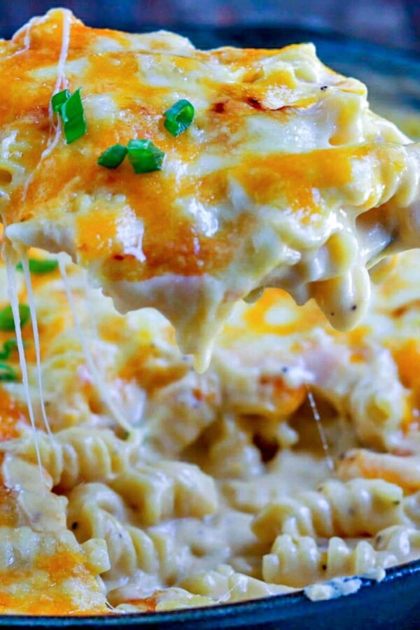 spoonful of cheese pasta in a skillet