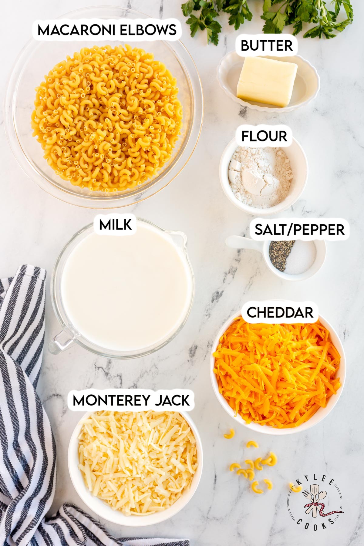 ingredients for homemade mac and cheese laid out and labeled