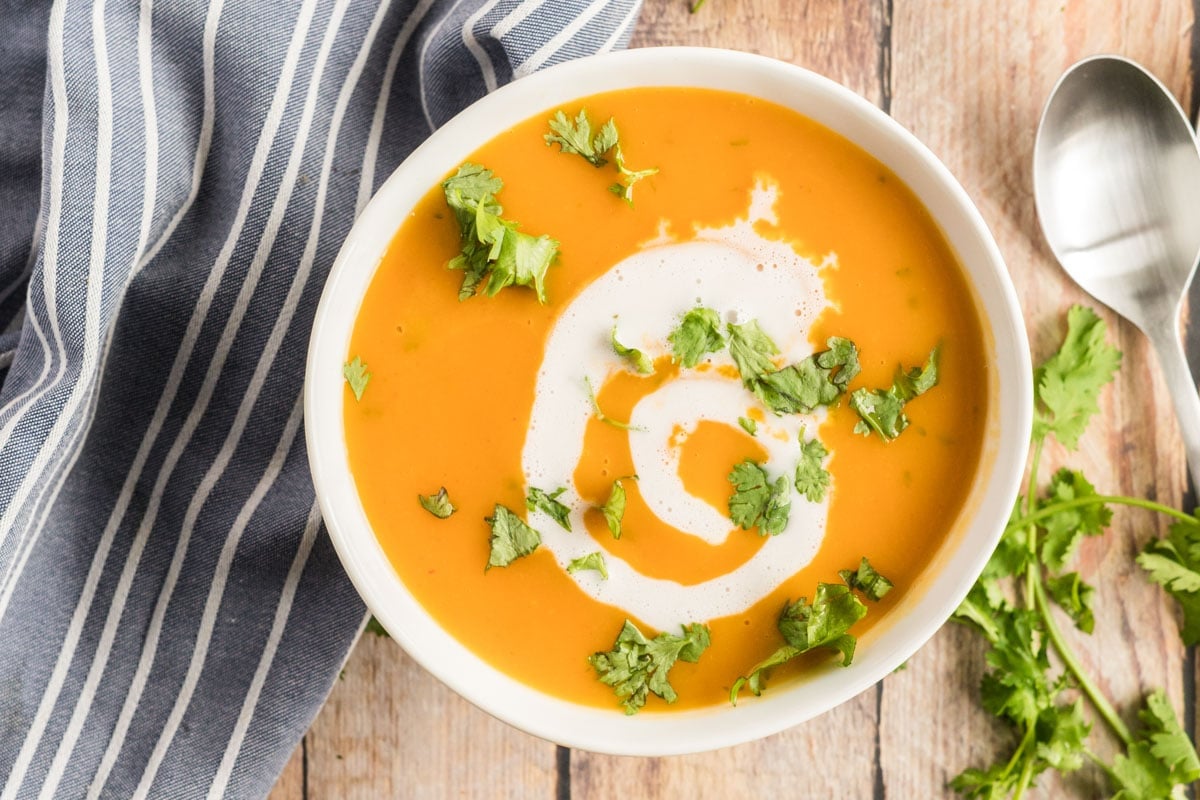 Instant Pot Butternut Squash Soup with cilantro and a napkin