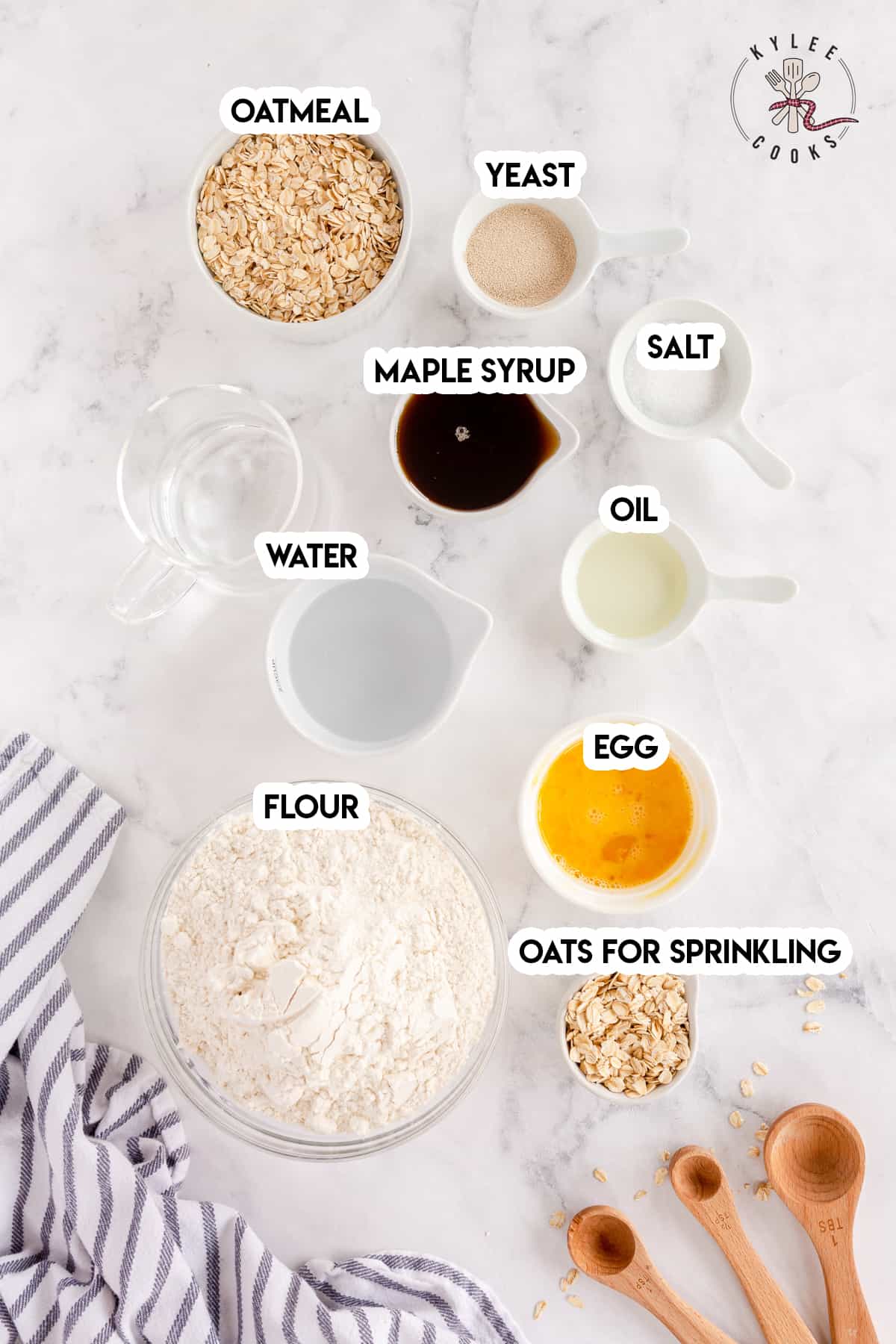 ingredients to make oatmeal bread laid out and labeled