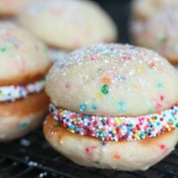 birthday cake whoopie pies on a cooling rack