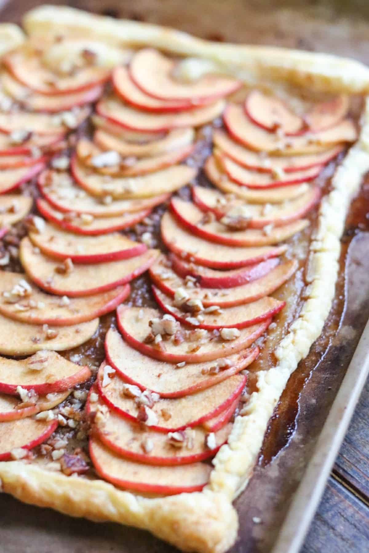 puff pastry apple tart on a cooking sheet