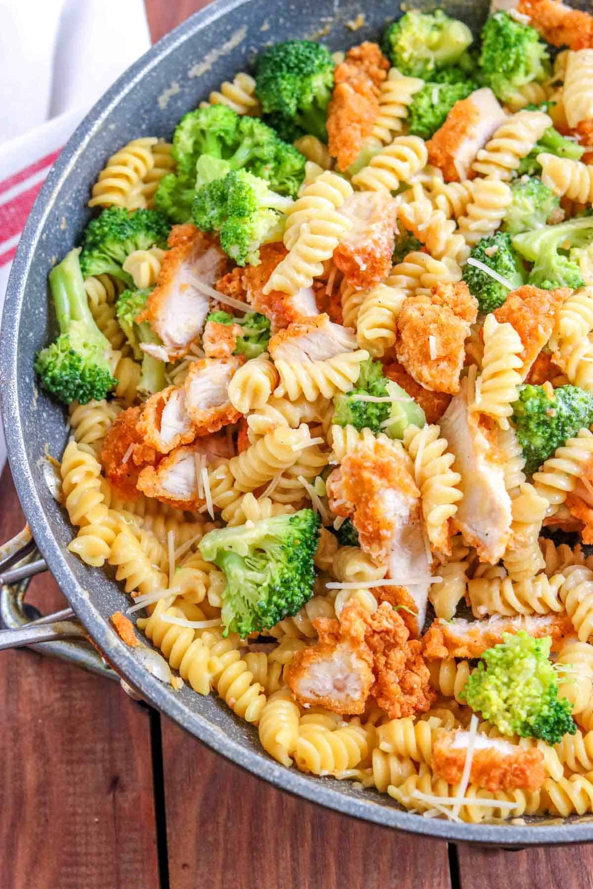 chicken and broccoli alfredo in a skillet
