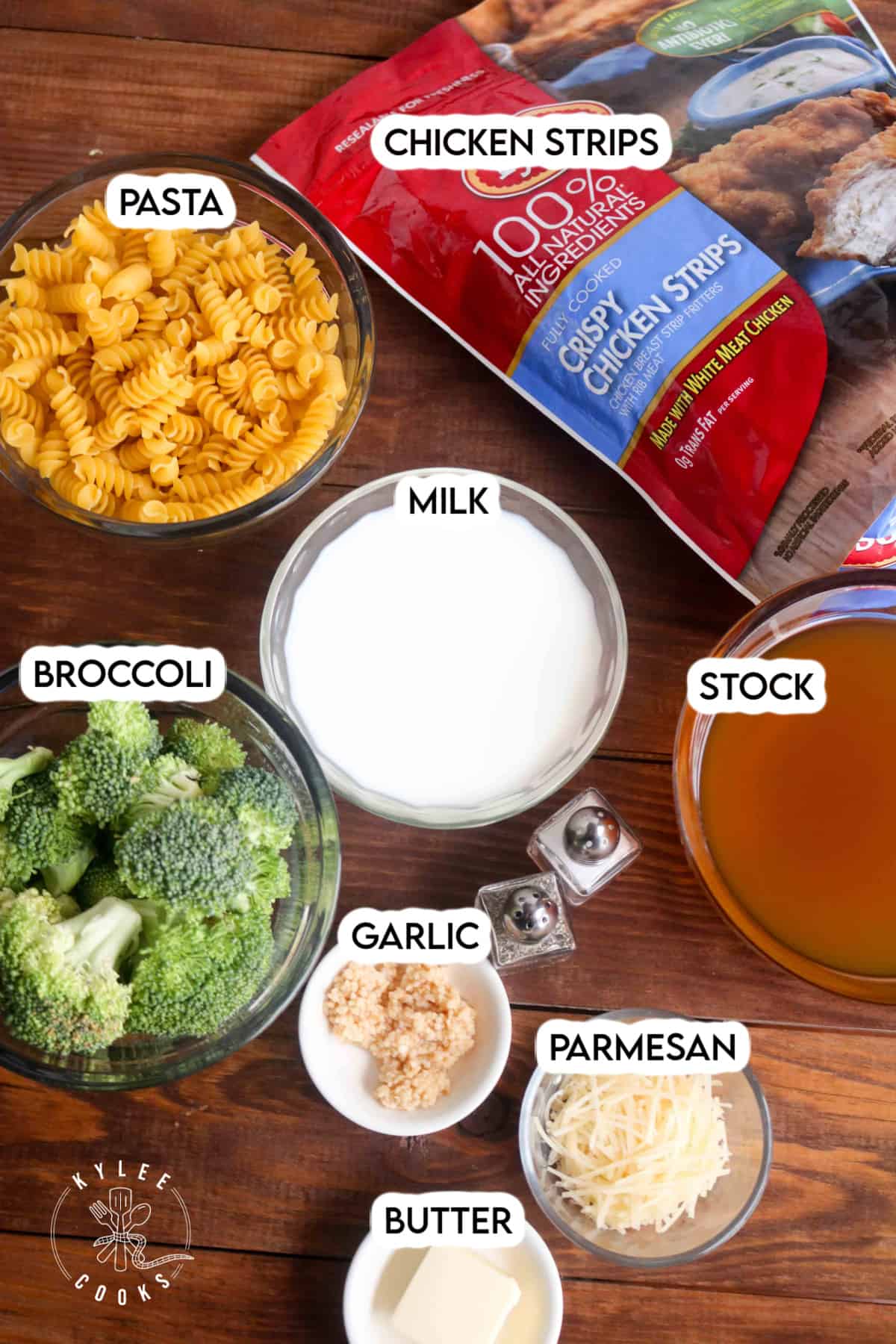 ingredients to make chicken broccoli pasta laid out and labeled