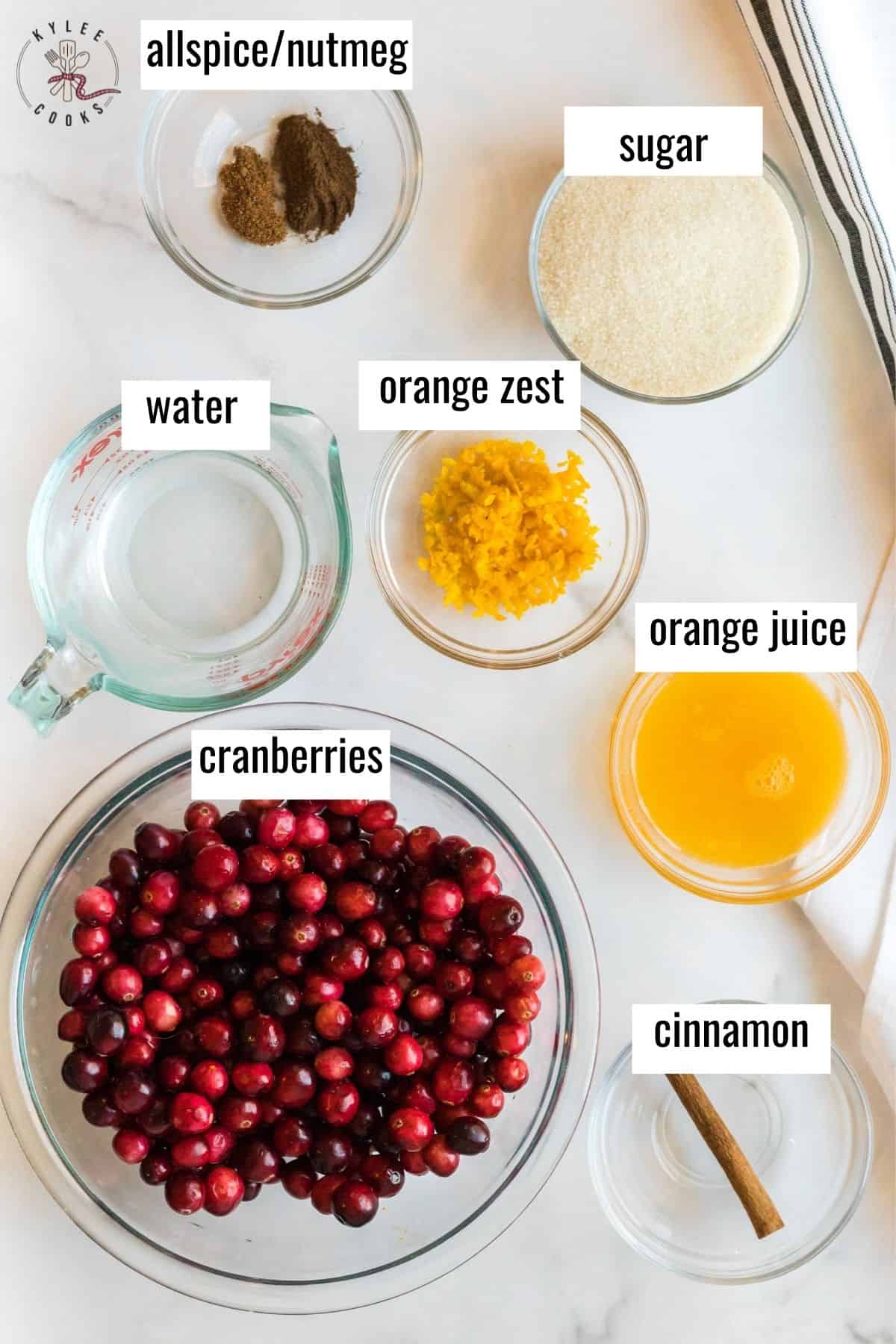 ingredients to make cranberry sauce laid out and labelled