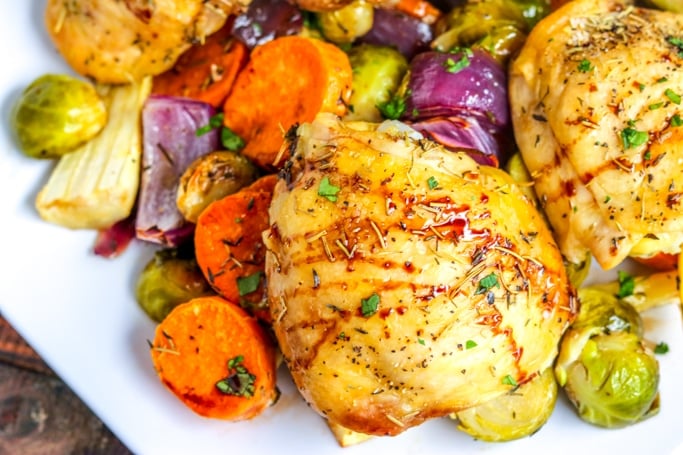 Roast Chicken with Vegetables on a white plate
