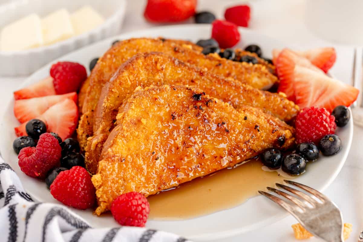 crunchy french toast on a plate with berries