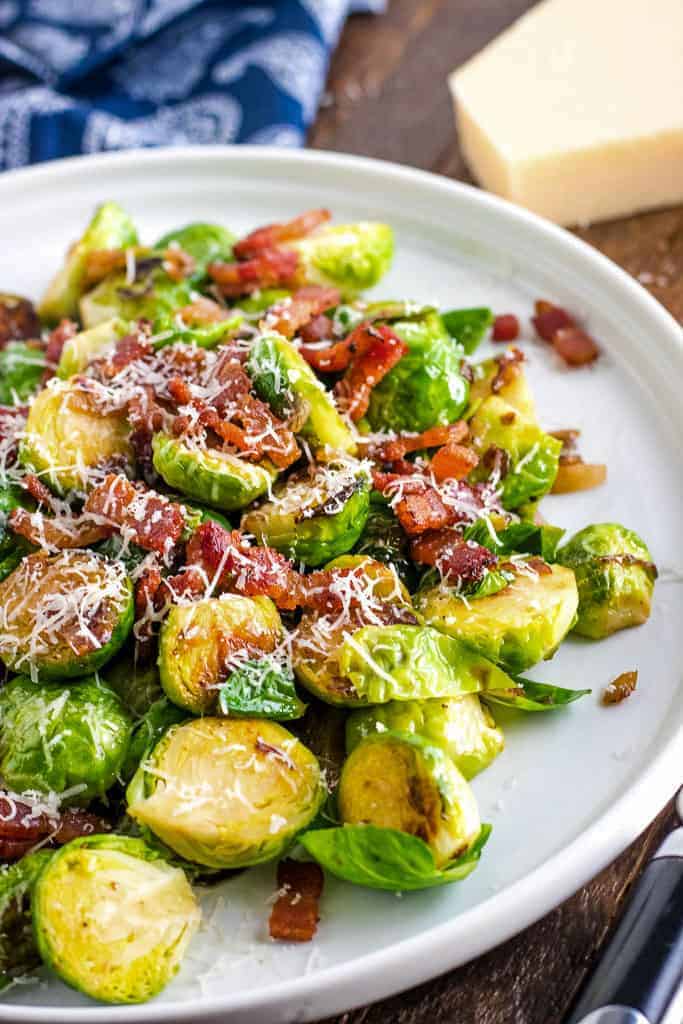 Roasted Brussels Sprouts with Bacon on a white plate
