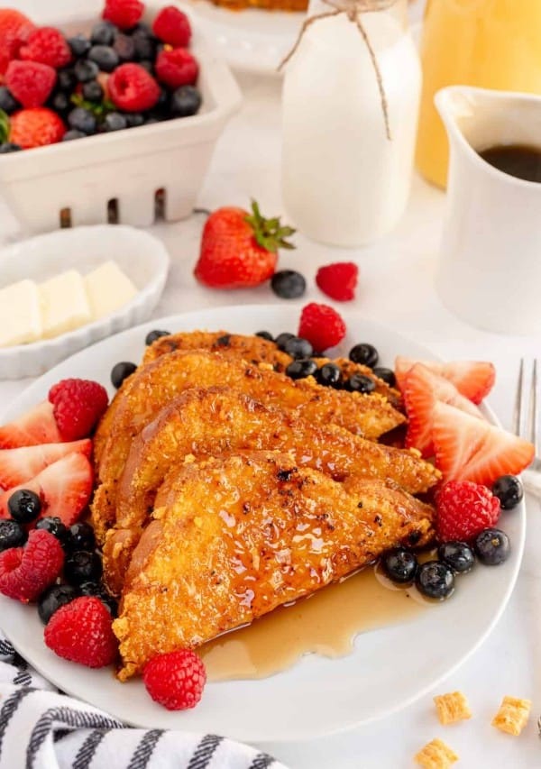crunchy french toast on a plate with berries