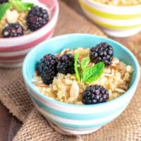 quinoa in a bowl with yogurt and blackberries