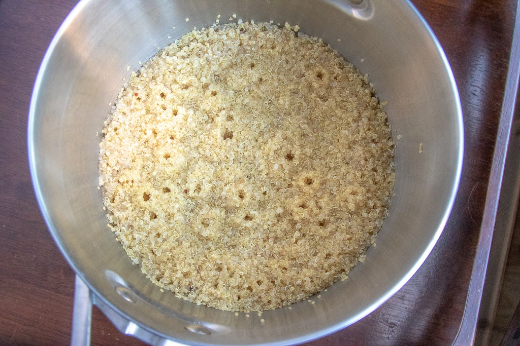 fully cooked quinoa in a saucepan - with air pockets