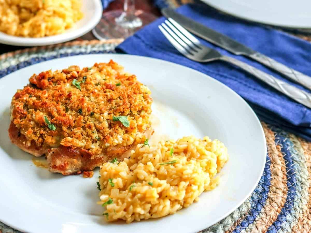 risotto on a plate with pork chops