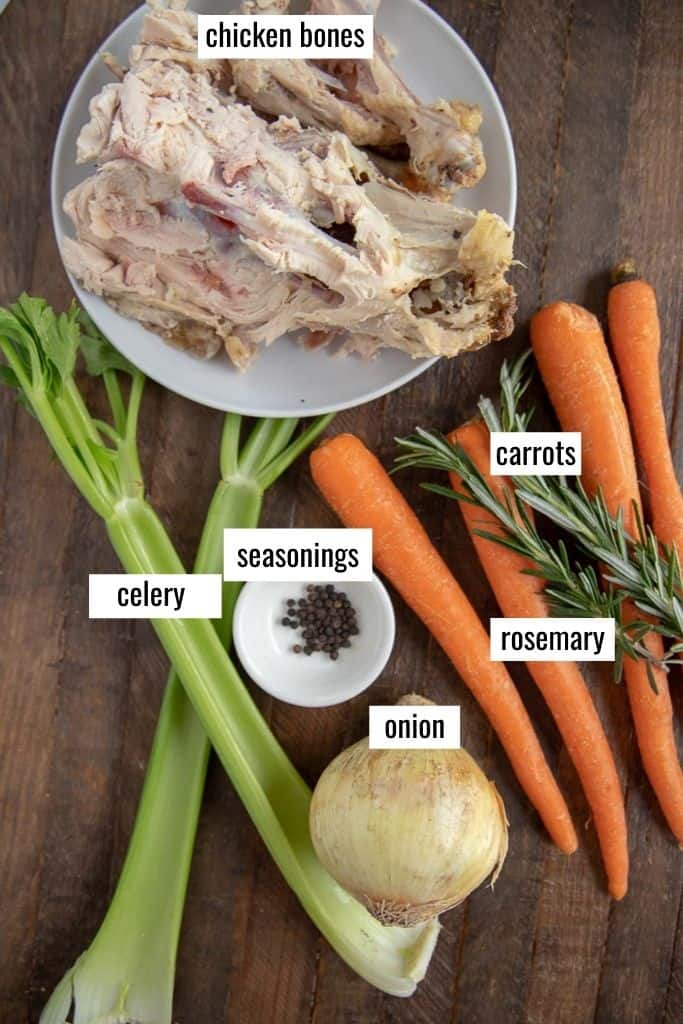 ingredients for making chicken stock laid out and labeled