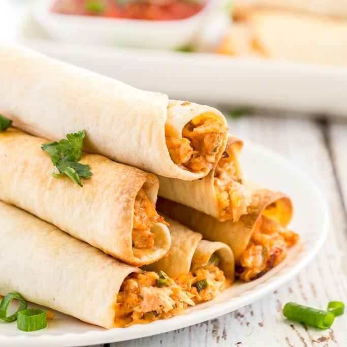 stack of chicken taquitos