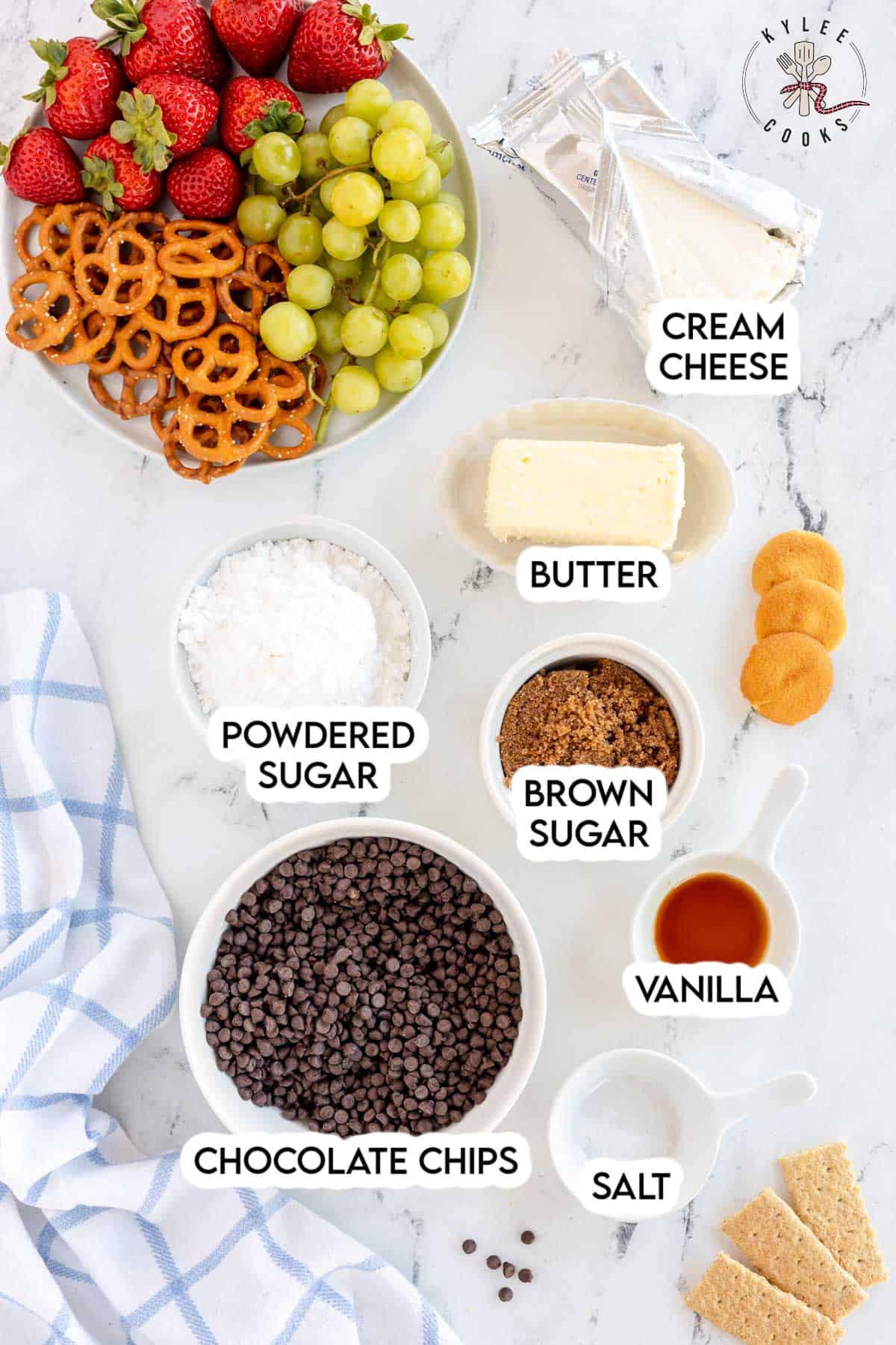 ingredients to make chocolate chip cookie dough dip laid out and labeled.
