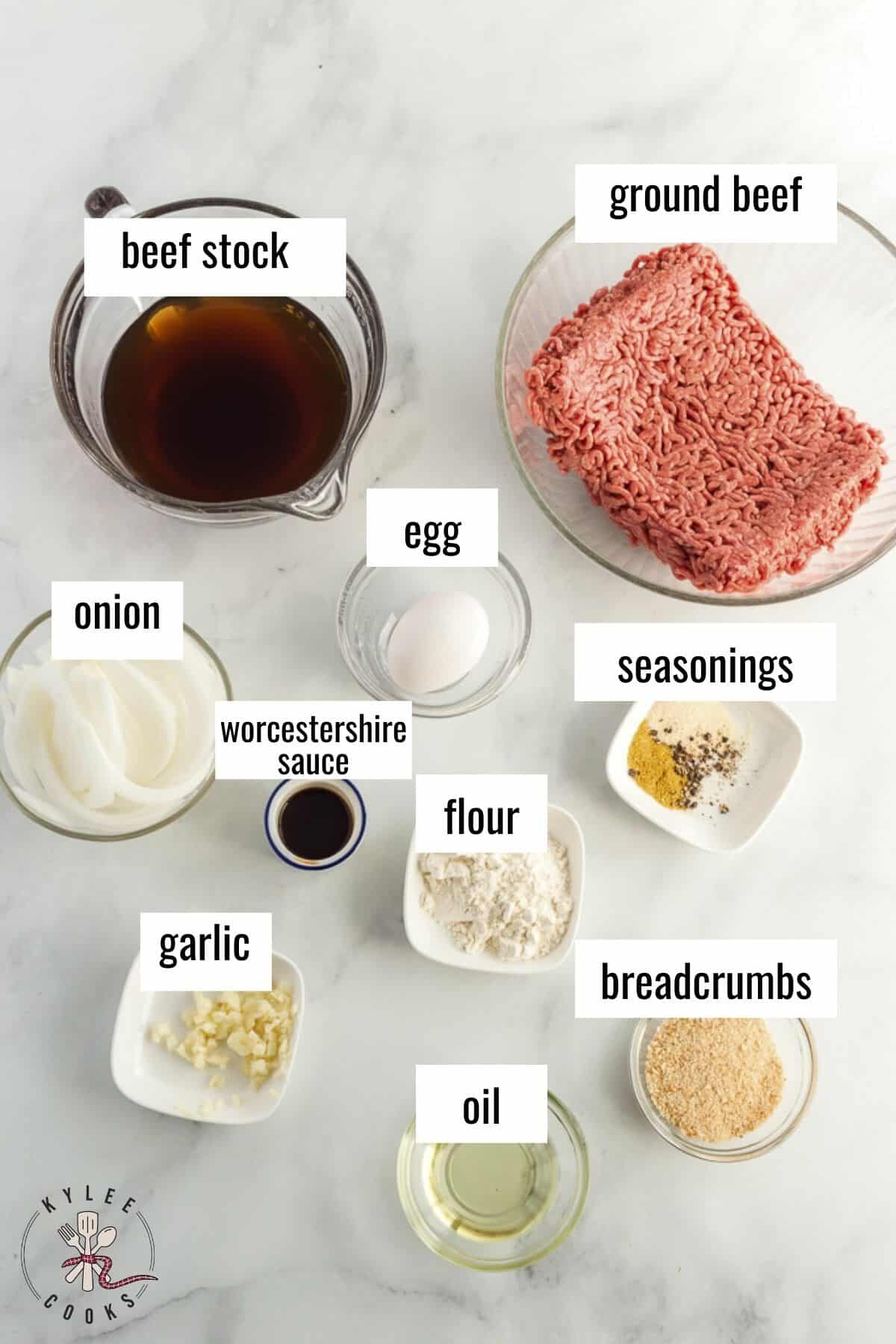 ingredients for hamburger steaks laid out and labeled