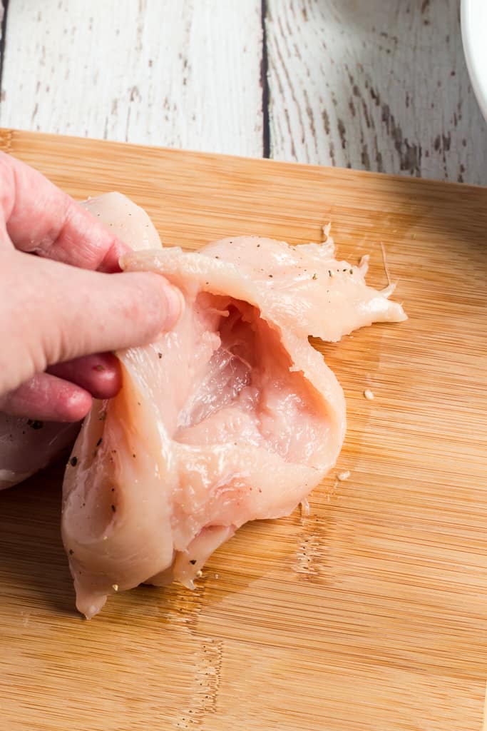 chicken breast cut open to form a pocket