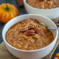 pumpkin oatmeal in a bowl with pecans