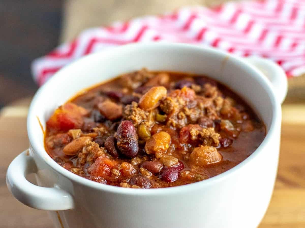 chili without toppings in a white bowl