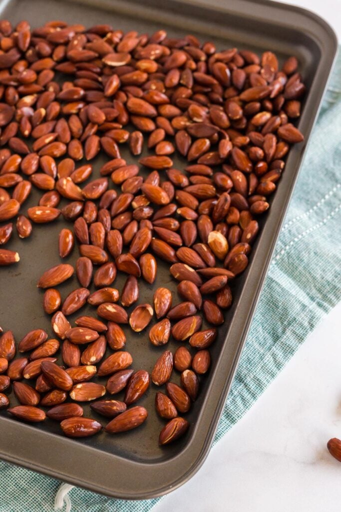 roasted almonds on a baking sheet