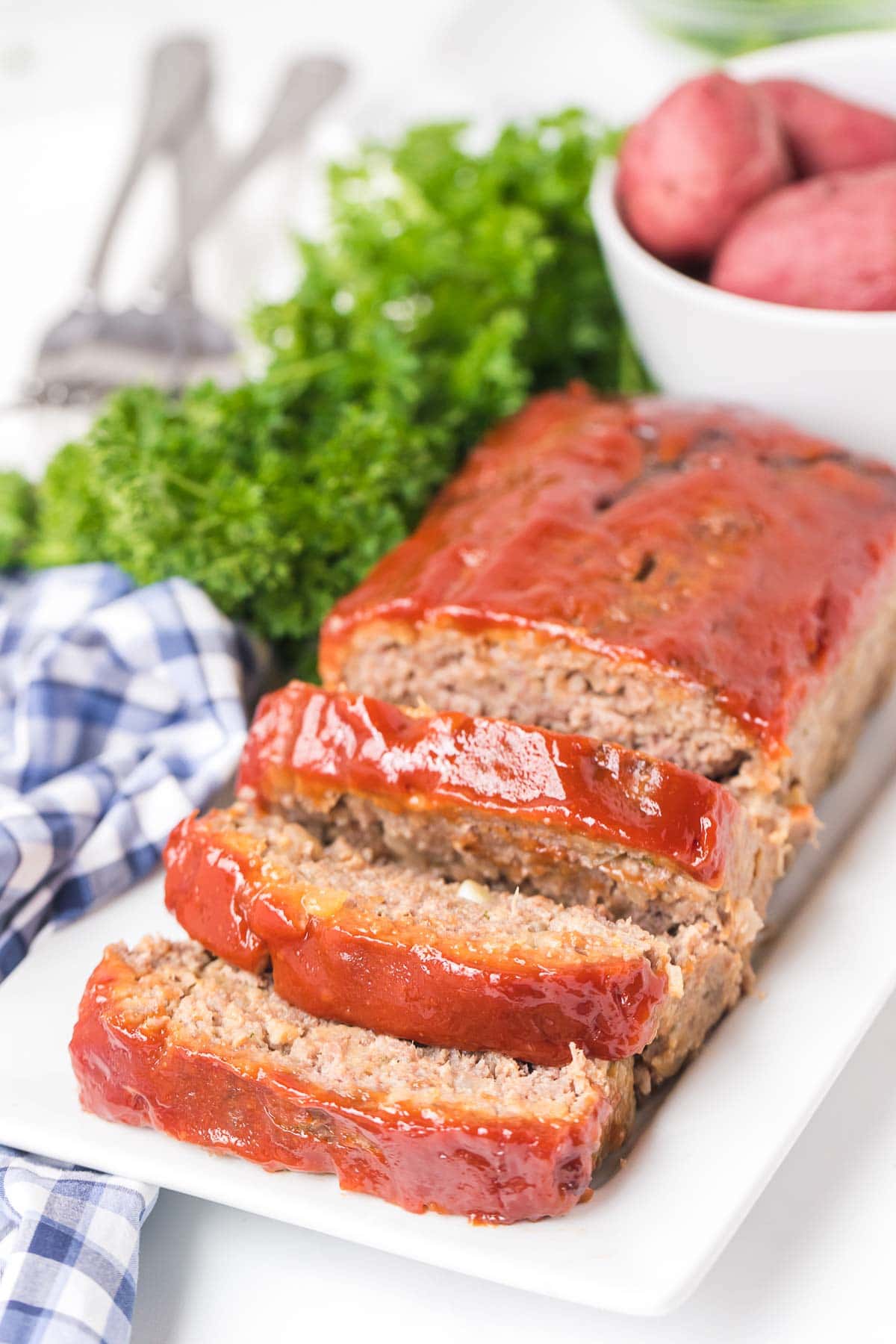 meatloaf slices on a white plate