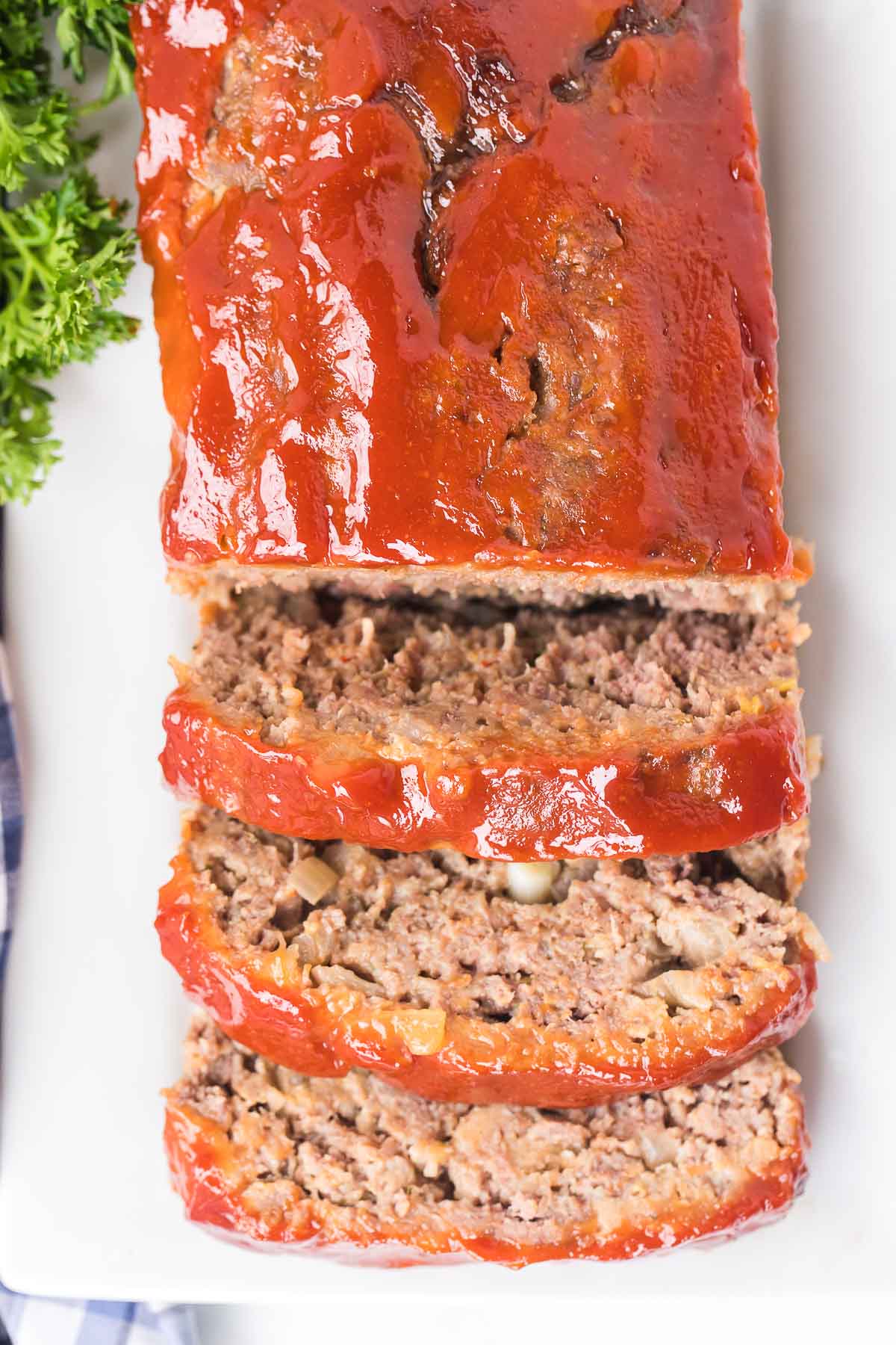 overhead shot of meatloaf with three slices cut